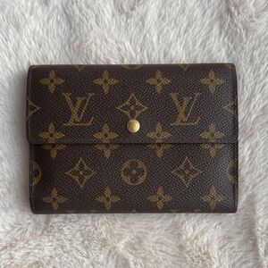Authentic Louis Vuitton snap continental Monogram wallet